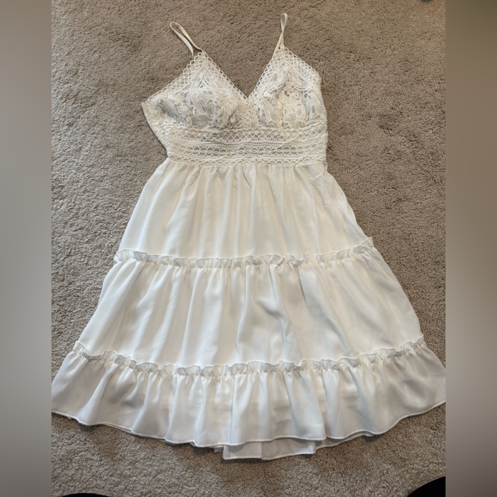 White Mini Dress with Lace Trim and Ruffled Skirt